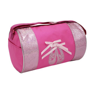 A pink duffel bag with a bow on the front.