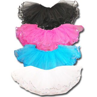 A group of different colored tutus and skirts.